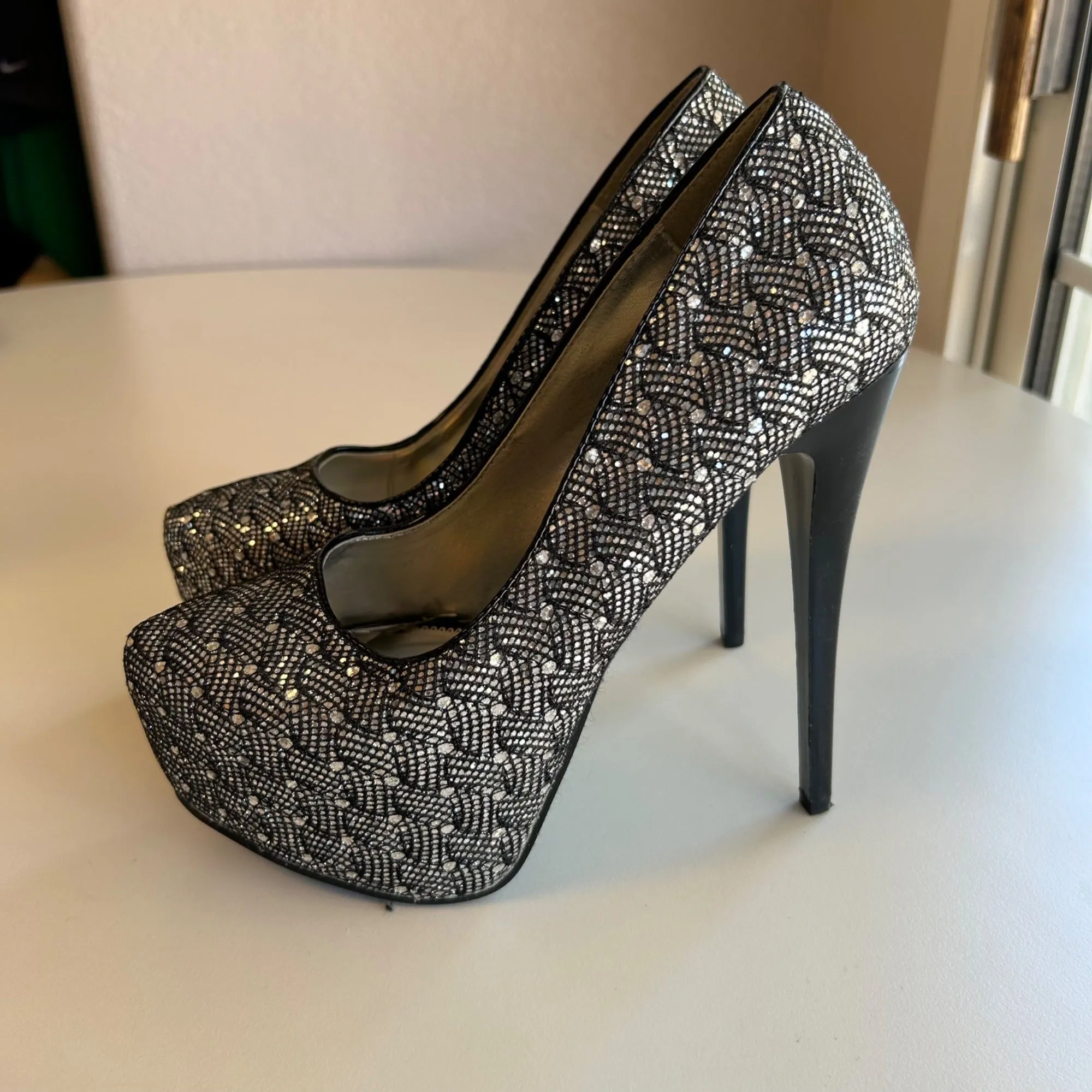 Paprika Women's Size 7 Silver and Black Closed Toes Stiletto High Heels