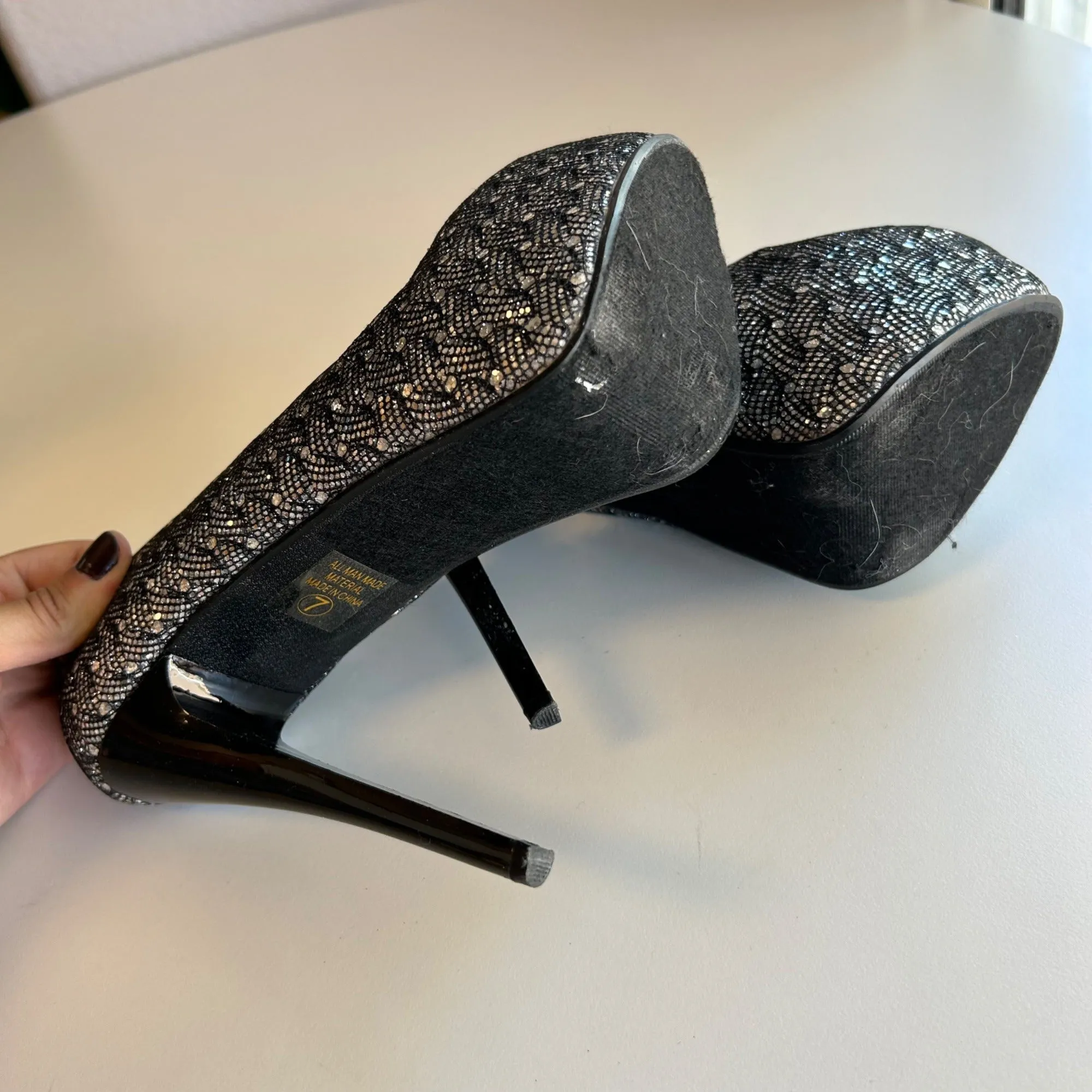 Paprika Women's Size 7 Silver and Black Closed Toes Stiletto High Heels